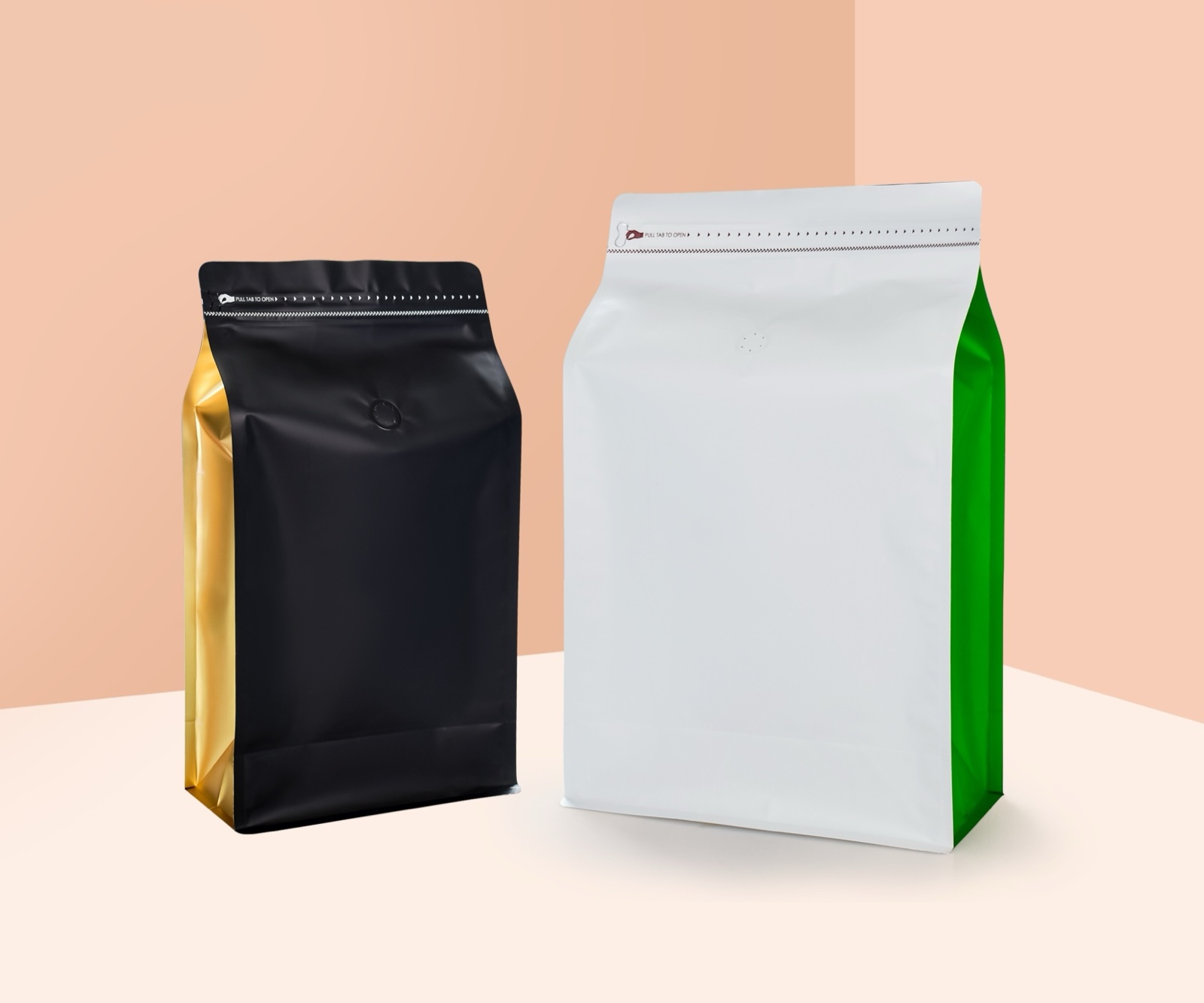 Black and white flat-bottom packaging bags with metallic gold and green side panels